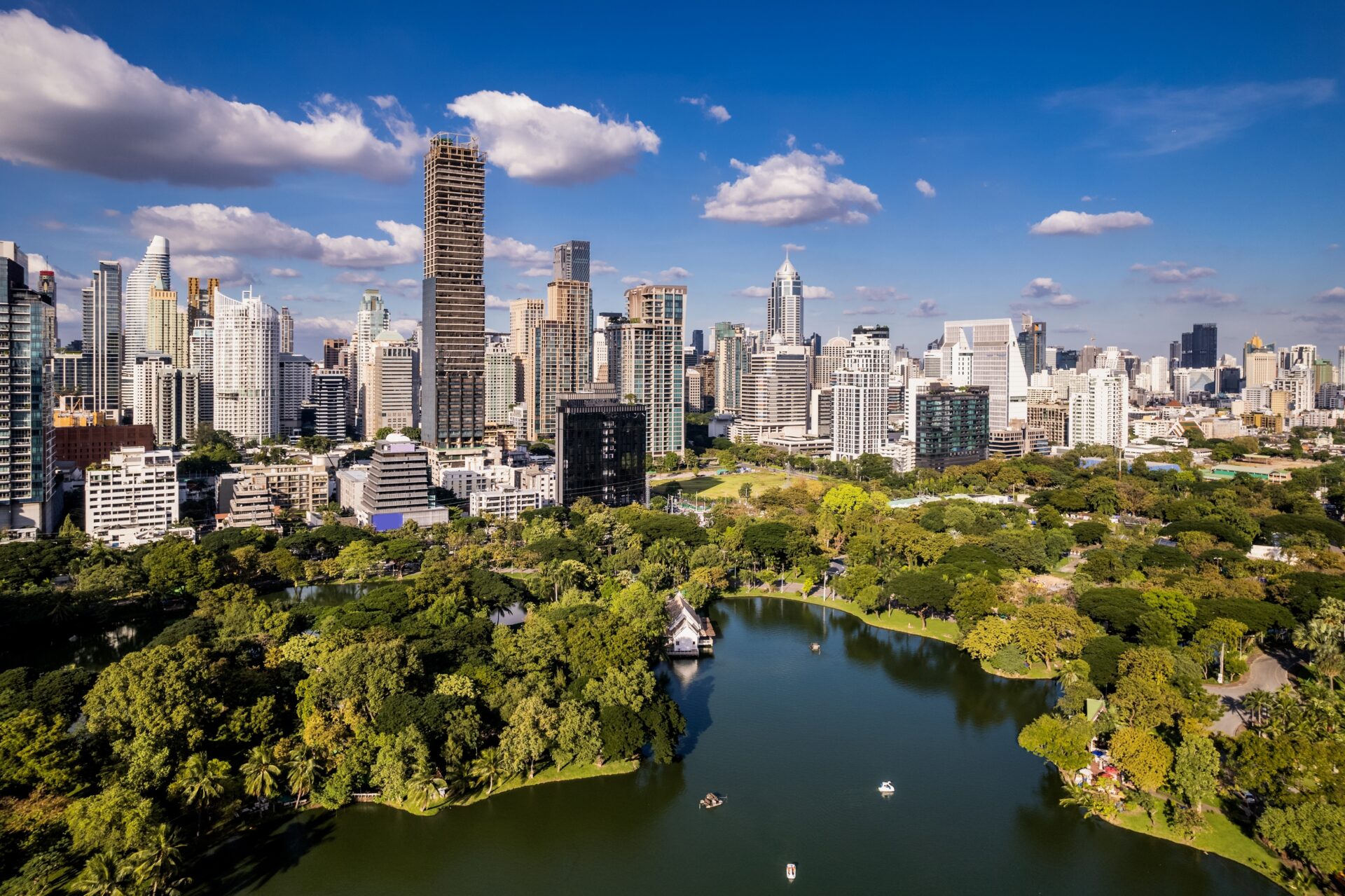 Aerial view of Lumpini Park with highrise condos and offices in Sathorn in the background