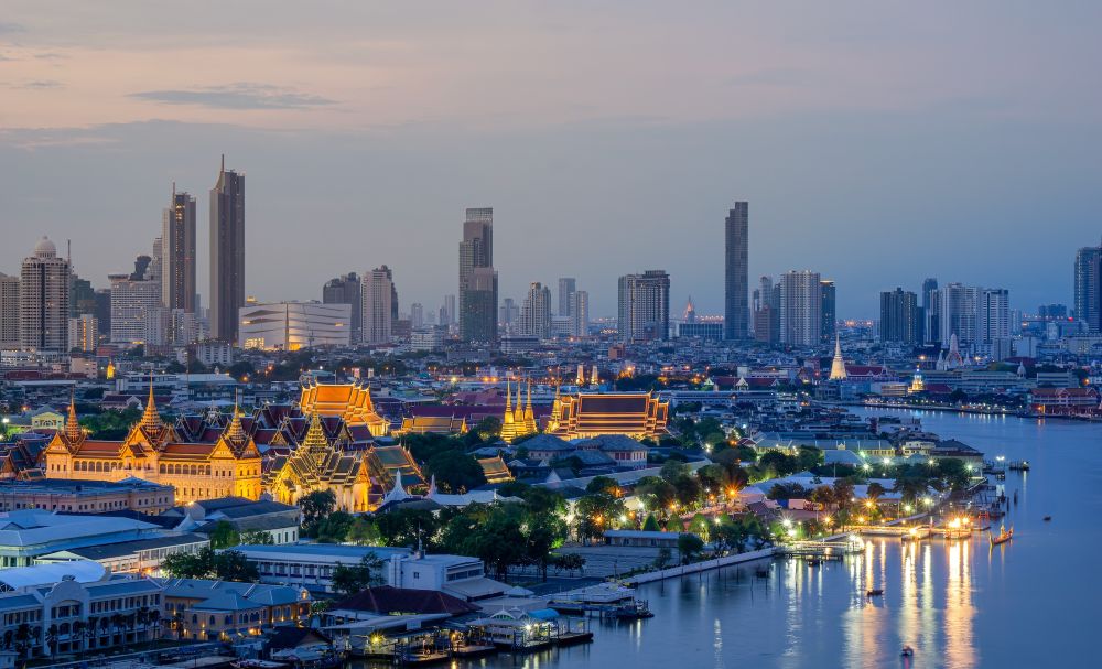  Evening aerial over the Grand Palace and Chao Phraya River in Bangkok